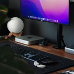 a computer on a desk fallout mod manager interface, load order list, pc desktop modding screen