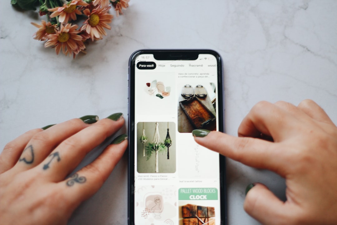 person holding silver iphone 6 mobile shopping, ecommerce app, product browsing