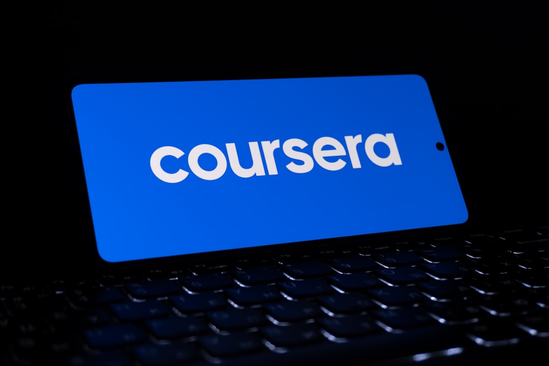 Coursera logo on a blue background corporate training dashboard, online learning interface, employee course platform