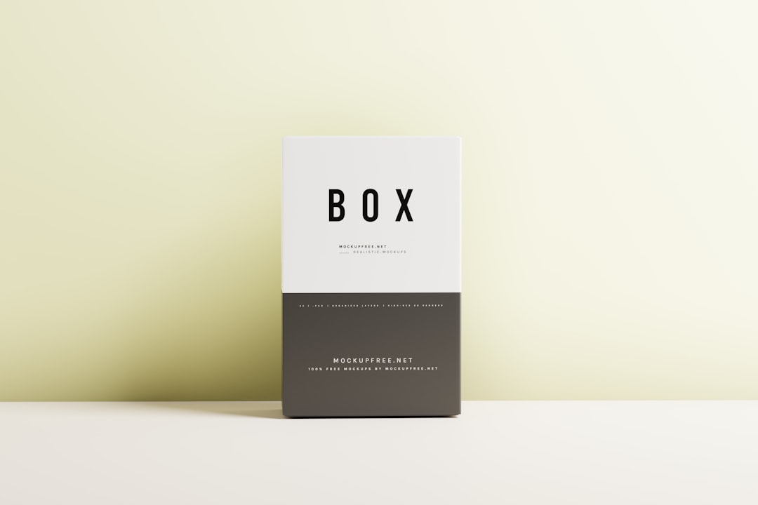 a box sitting on top of a white table online store branding package mockup box business card social media