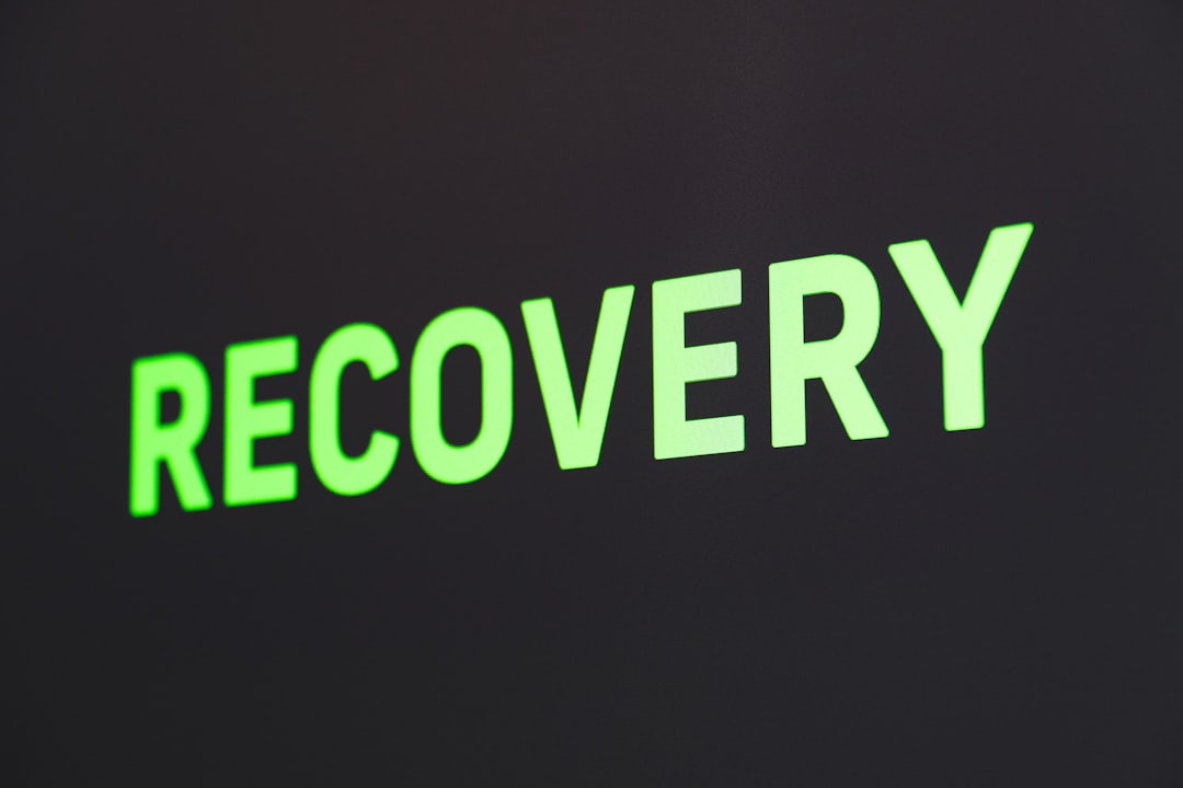 a close up of a sign that reads recovery data recovery software interface, iphone scan progress, computer data recovery tool