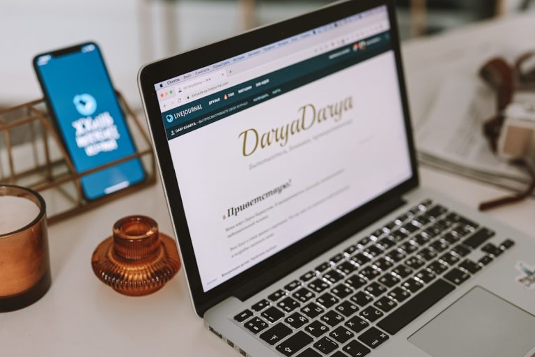 a laptop computer sitting on top of a desk drag and drop editor, website builder dashboard, beginner website design