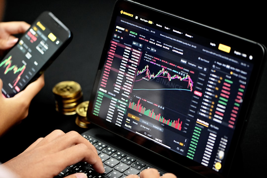 person using black tablet computer tokenized assets, blockchain dashboard, digital finance