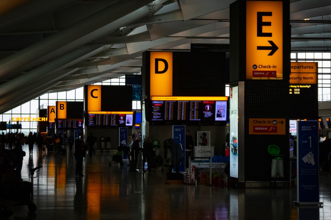 building interior photograph airport departure board international travel connection