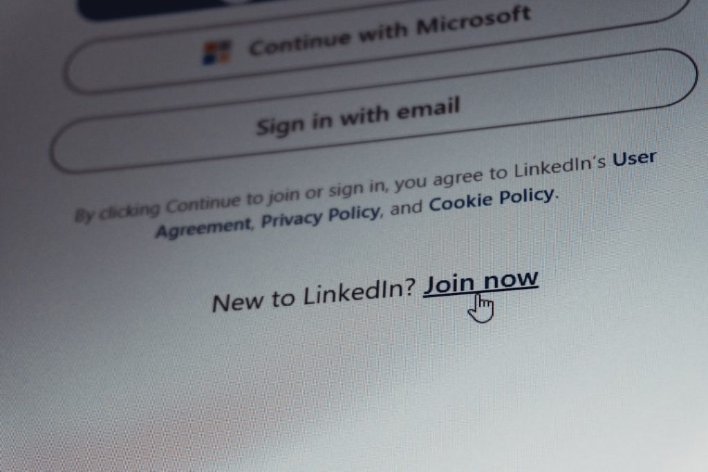 Linkedin login screen with join now option registration form, email field, privacy note