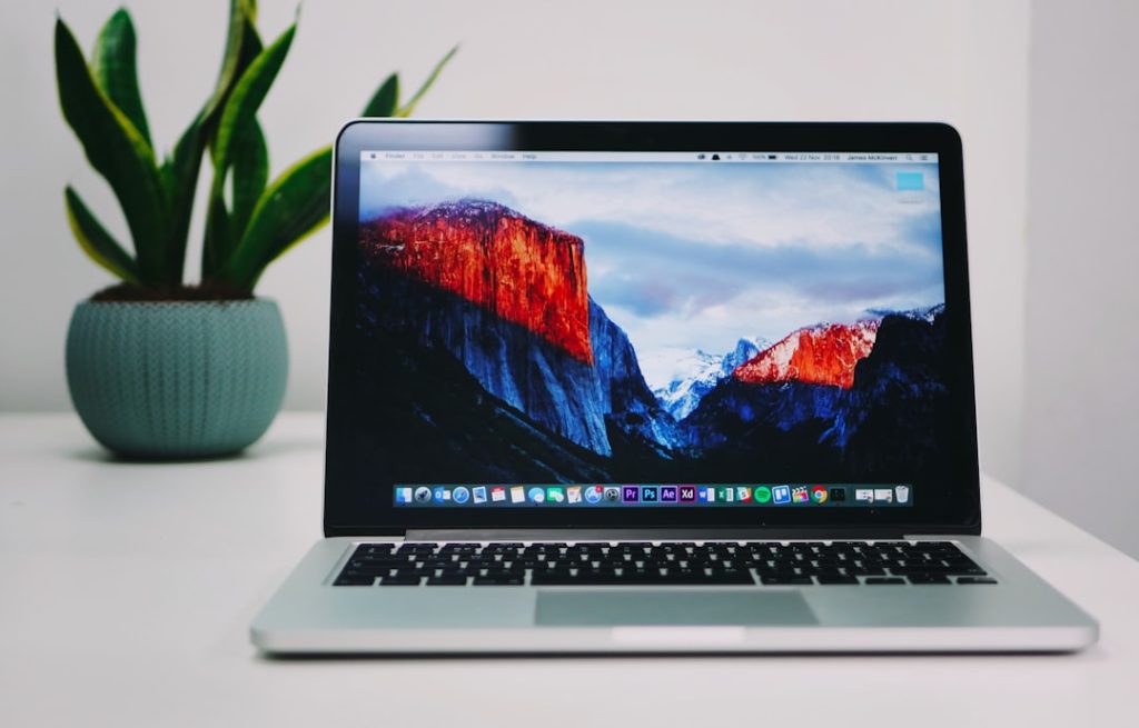 MacBook Pro calendar app interface on laptop, scheduling screen, clean workspace