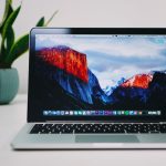 MacBook Pro calendar app interface on laptop, scheduling screen, clean workspace
