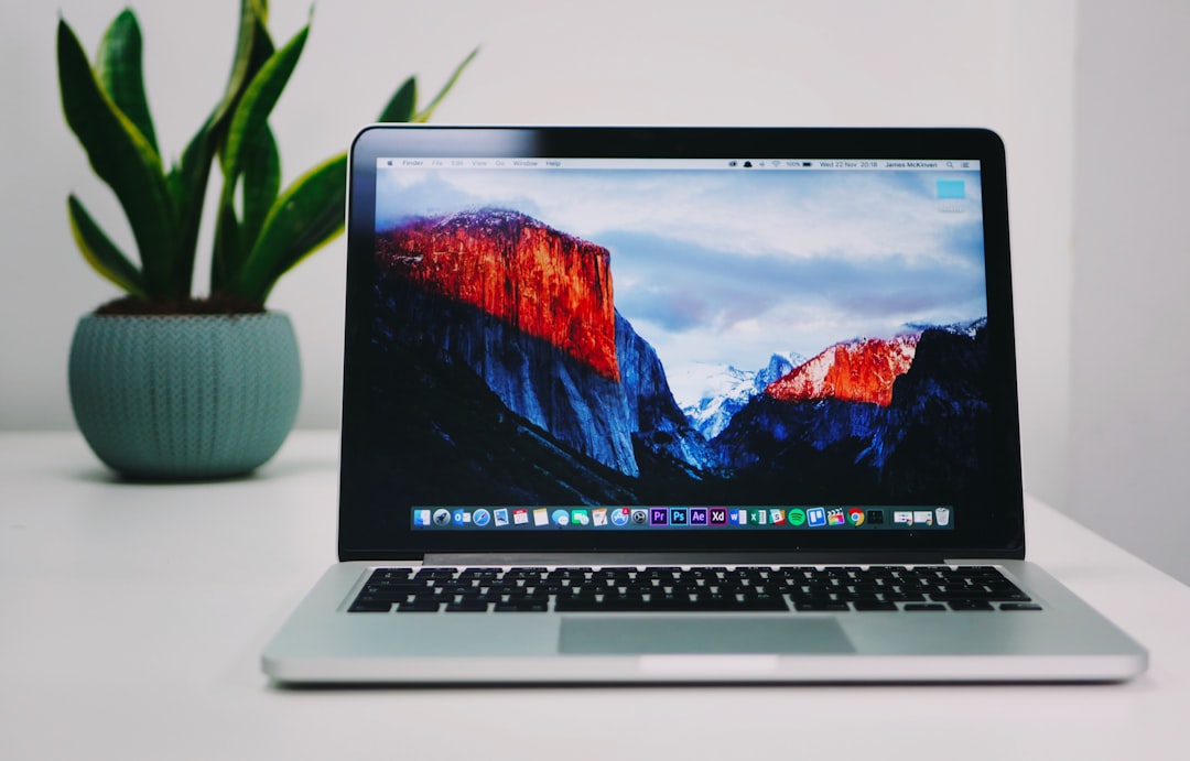 MacBook Pro calendar app interface on laptop, scheduling screen, clean workspace