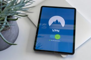 black tablet computer turned on displaying VPN vpn tunnel, torrent client, privacy settings