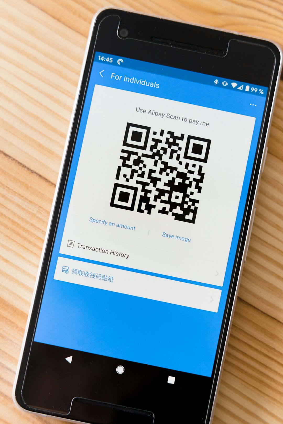 blue and white box with qr code smartphone showing authenticator app, six digit code screen, secure login interface