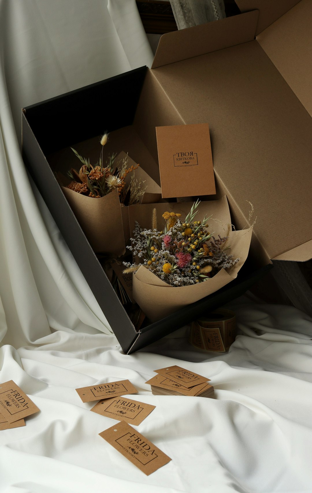 a box with a bunch of flowers inside of it professional packers wrapping furniture, bubble wrap packing, fragile items boxed