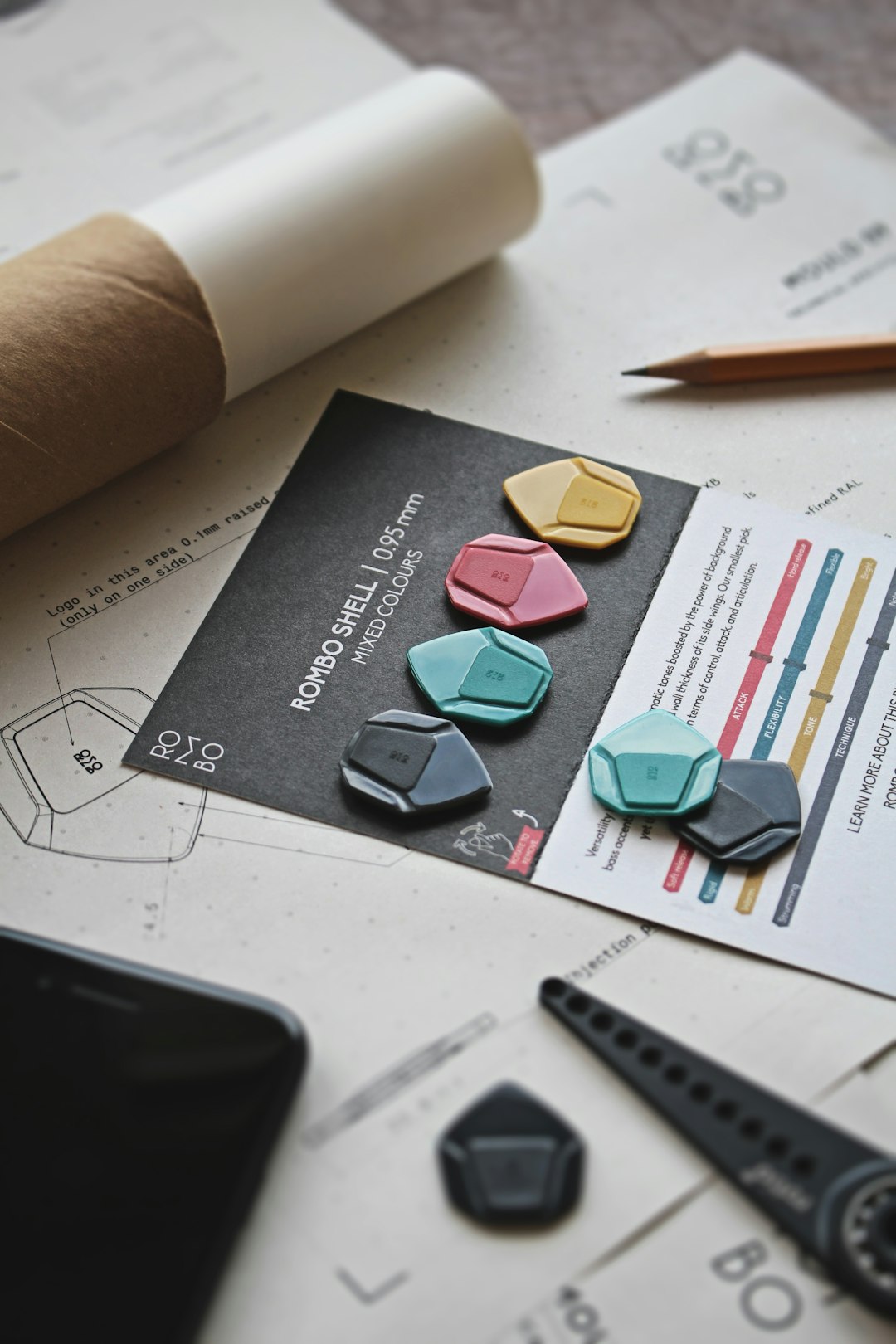 a pair of scissors and some paper on a table professional business card layout, editable design template, colorful branding elements