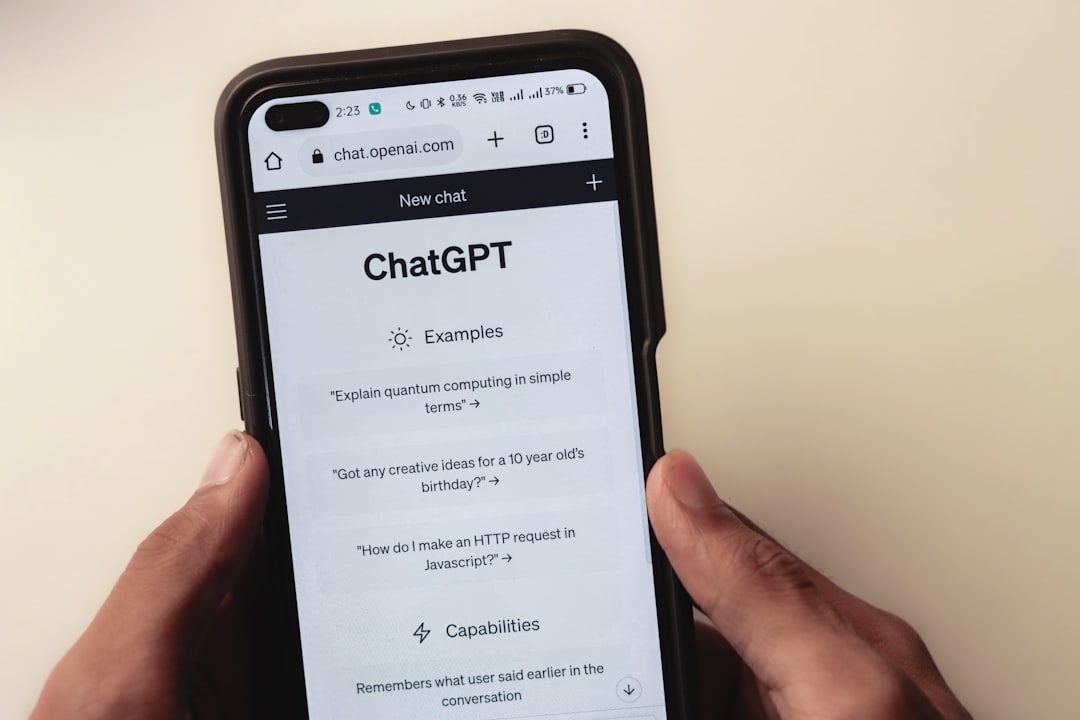 a person holding a cell phone with a chat app on the screen live chat widget, chatbot conversation, customer messaging app
