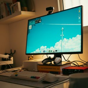 Computer setup with monitor, keyboard, and webcam. social media templates animation laptop screen creative workspace