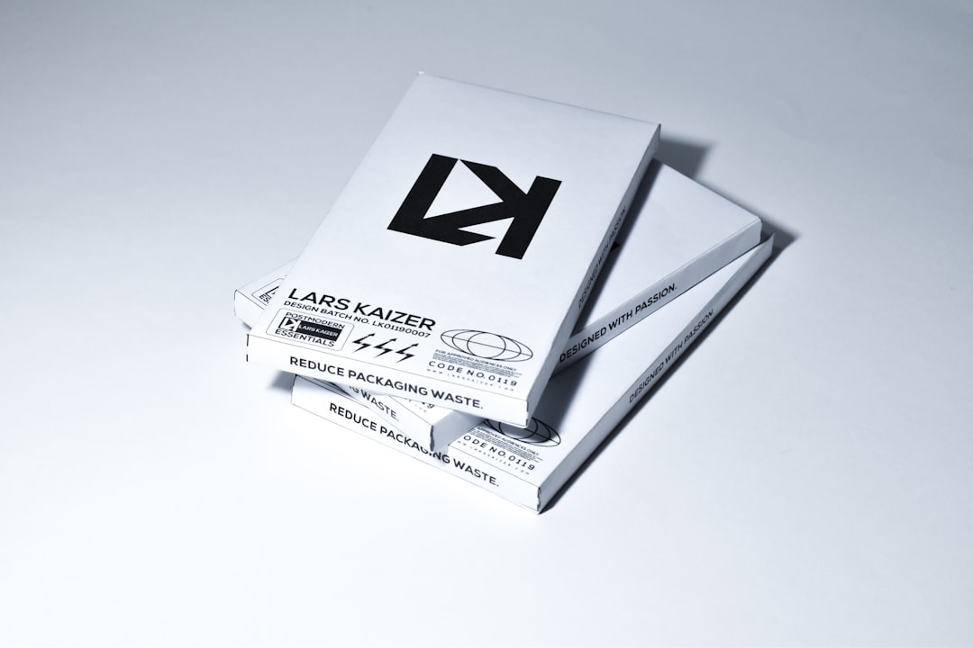 white and black book on white table minimalist business card mockup, white background, modern typography