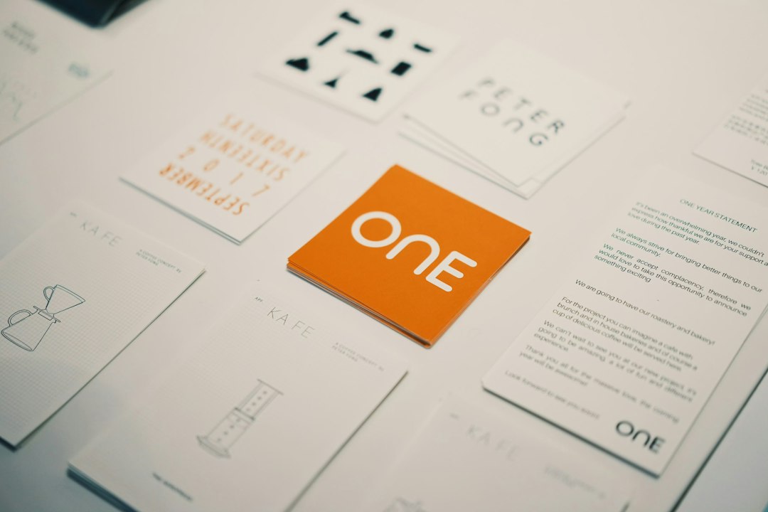 Orange card with "one" logo surrounded by other cards creative workflow, image generation, brand concept
