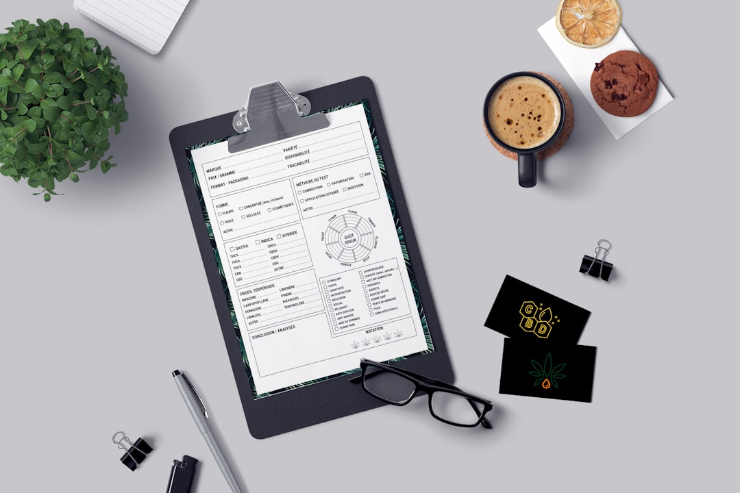 a clipboard with a checklist on it next to a cup of coffee and paper logbook, delivery clipboard, manual fleet records