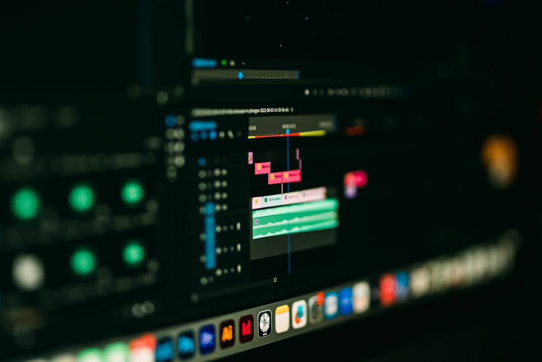 a close up of a computer screen with a blurry background audio editor, volume levels, quality check