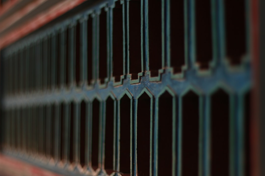 a close-up of a metal fence redis cache server, in memory database, api performance optimization