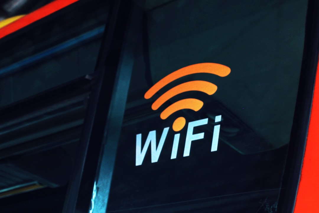 a close up of the wifi logo on the side of a bus wifi security, strong password, connected devices