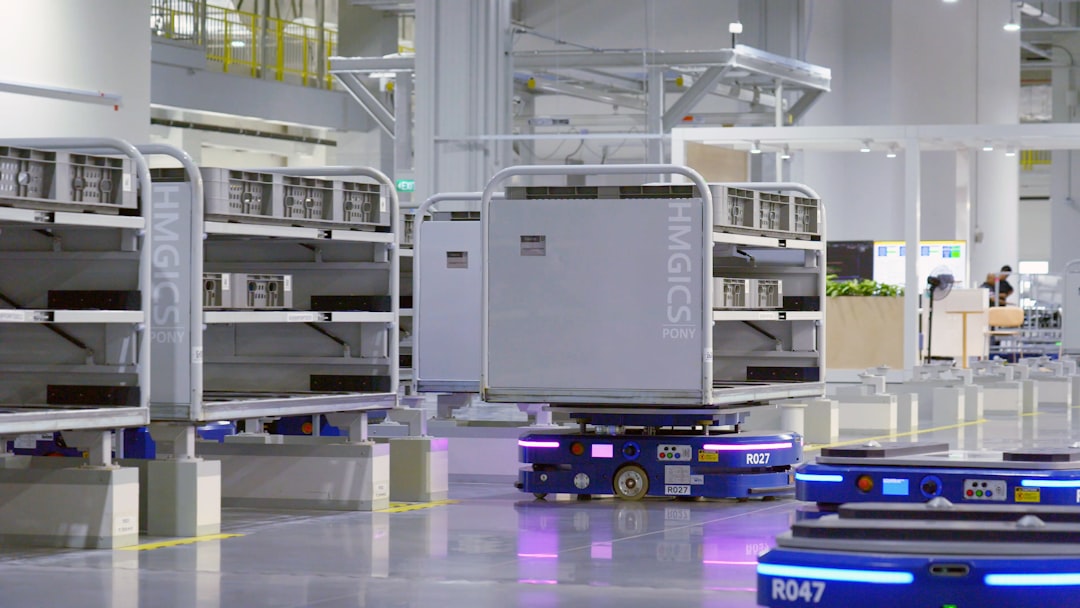 a large room filled with lots of shelves robotic sorting system, warehouse conveyor robots, package sorting automation