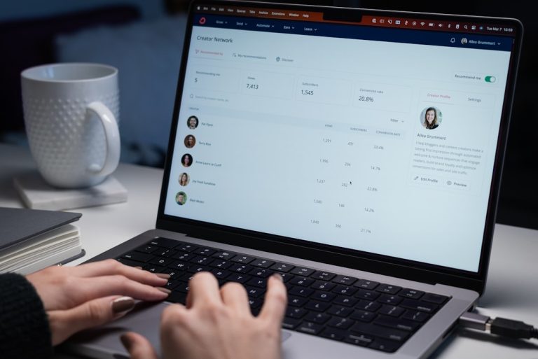a person typing on a laptop computer on a desk help desk dashboard, ai chatbot, support analytics