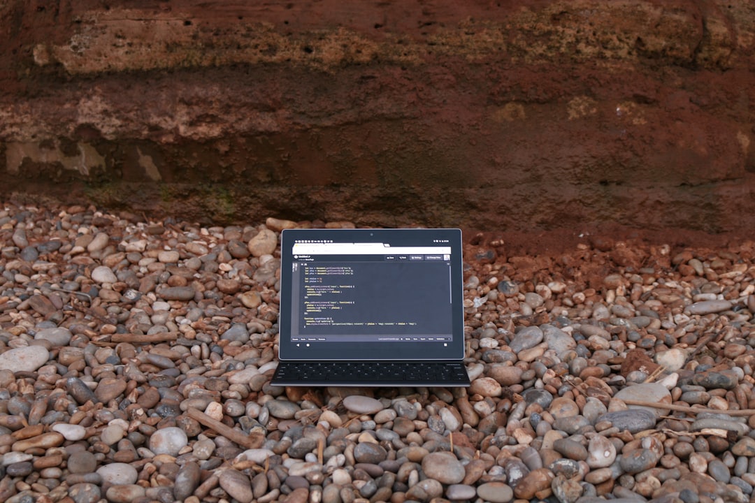 a sign on a rocky surface java version command output, terminal screen, java installation example