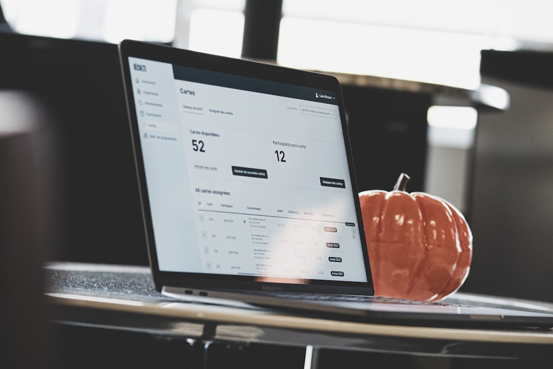 a tablet with a screen and a pumpkin on a table membership pricing table on website, subscription tiers display, WordPress theme layout
