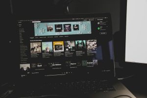 black laptop computer video editing timeline, frame accurate comments, media review platform