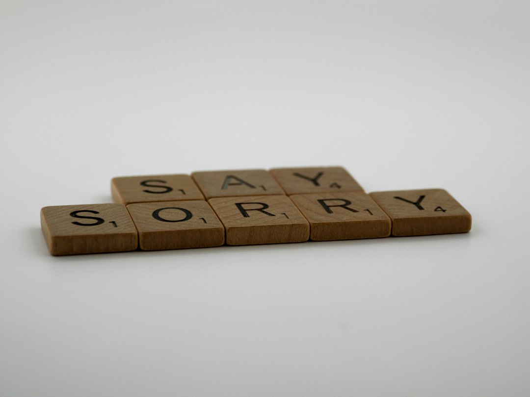 brown wooden blocks on white surface business apology, email response, customer care, simple checklist