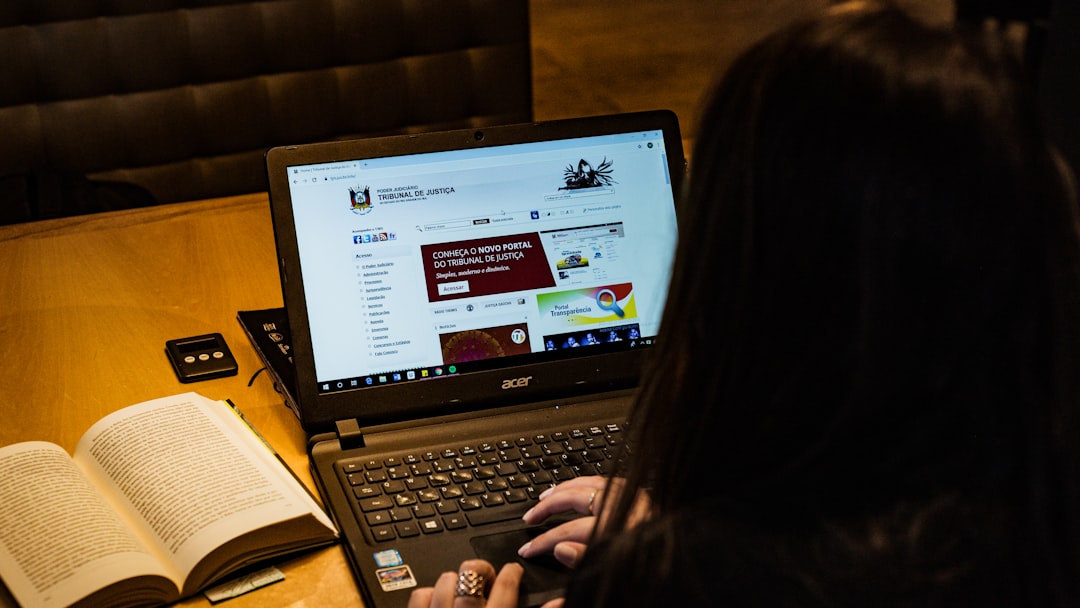 person using black laptop computer law office, software dashboard, legal team, case management