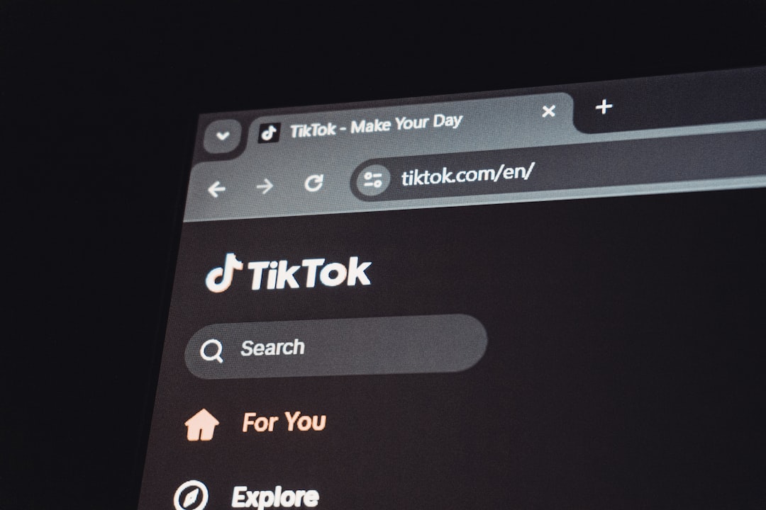 Tiktok website displayed on a computer screen. user submitting blog post on website, frontend submission form, online community platform