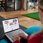 Woman on laptop in video conference call team collaboration online, shared document editing, virtual meeting screen