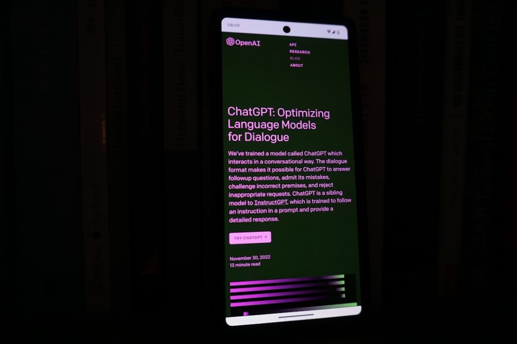 a cell phone with a lit up screen in the dark twitch chat interface, emote spam chat, streaming platform screen