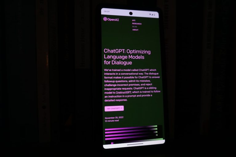 a cell phone with a lit up screen in the dark twitch chat interface, emote spam chat, streaming platform screen