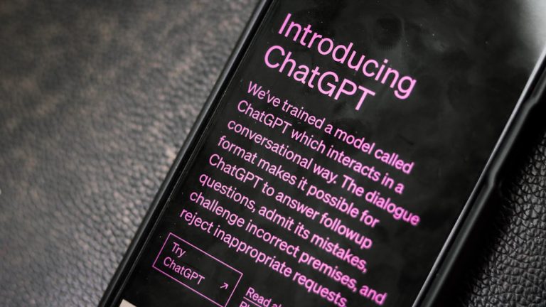 a close up of a cell phone on a table android storage settings, phone storage usage screen, storage management chart