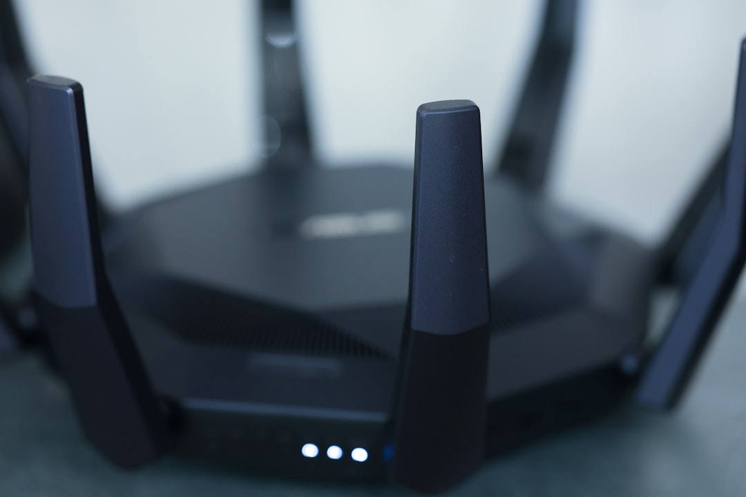 A close-up of a wireless router. wifi router restart, dns settings screen, smartphone network reset option