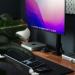 a computer on a desk fallout mod manager interface, load order list, pc desktop modding screen