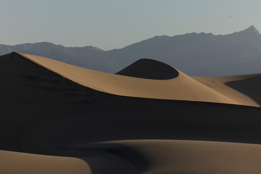 A desert landscape with mountains in the background black desert online launcher repair, game file verification screen, steam verify integrity window