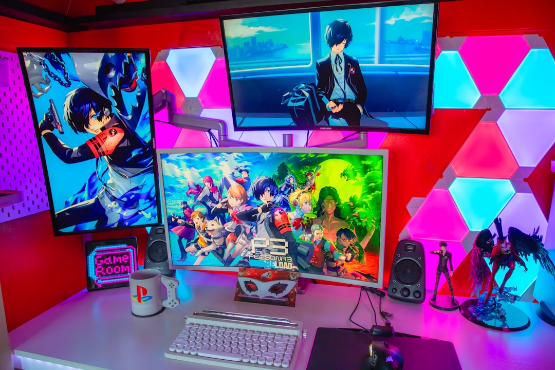 a desk topped with three computer monitors and a keyboard streamer wearing gaming glasses, RGB setup, headset and microphone, modern gaming room