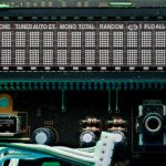 A digital display shows radio station and settings. gpu control panel, overclock settings, computer motherboard bios