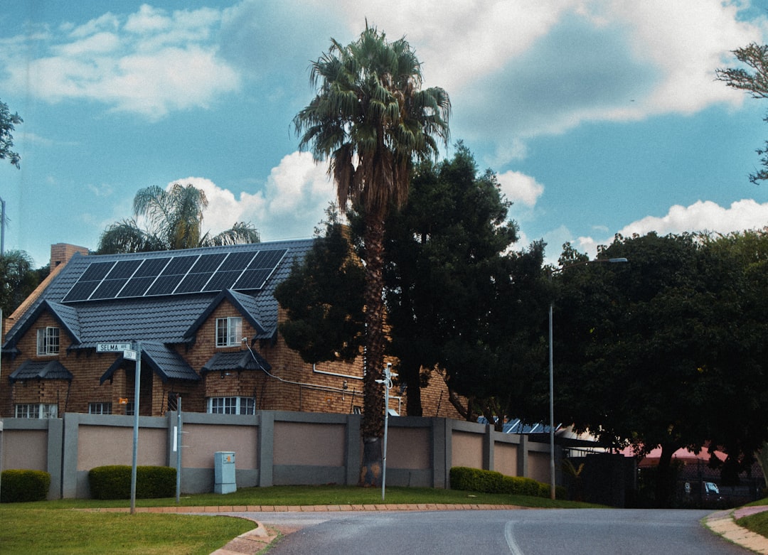 A large house with solar panels on the roof. eco cleaning, green home, solar panels, energy savings