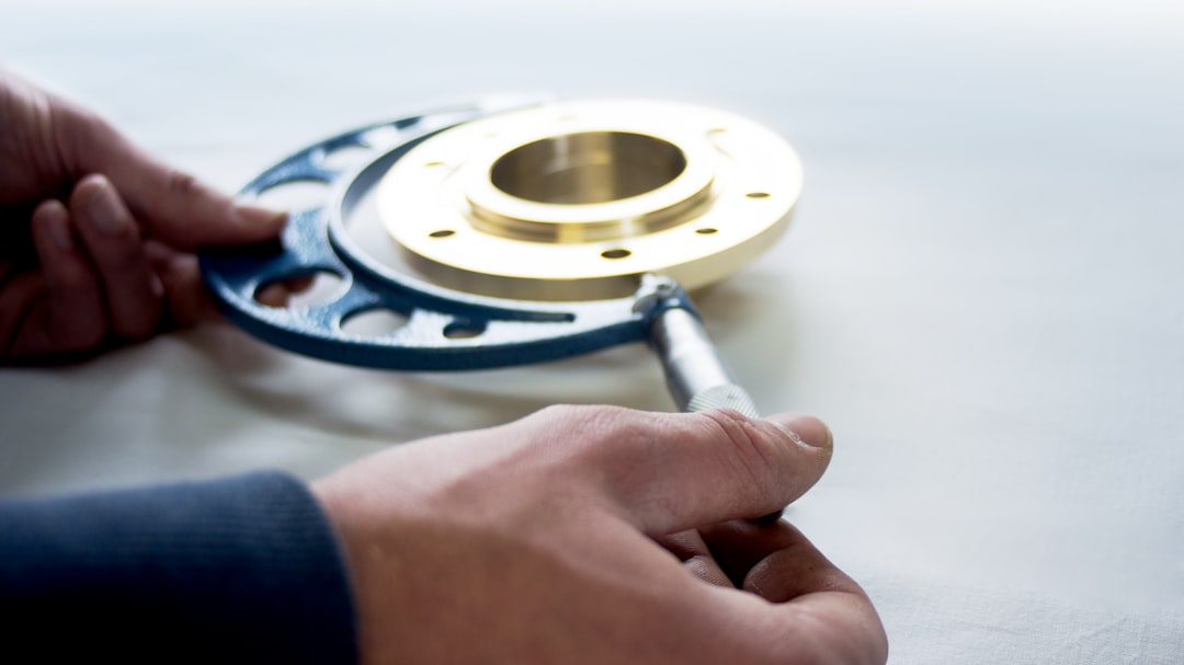 a person is working on a metal object risk management software interface, compliance analytics dashboard, healthcare administrator reviewing data