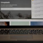 an open laptop computer sitting on top of a table dashboard interface analytics authentication user management