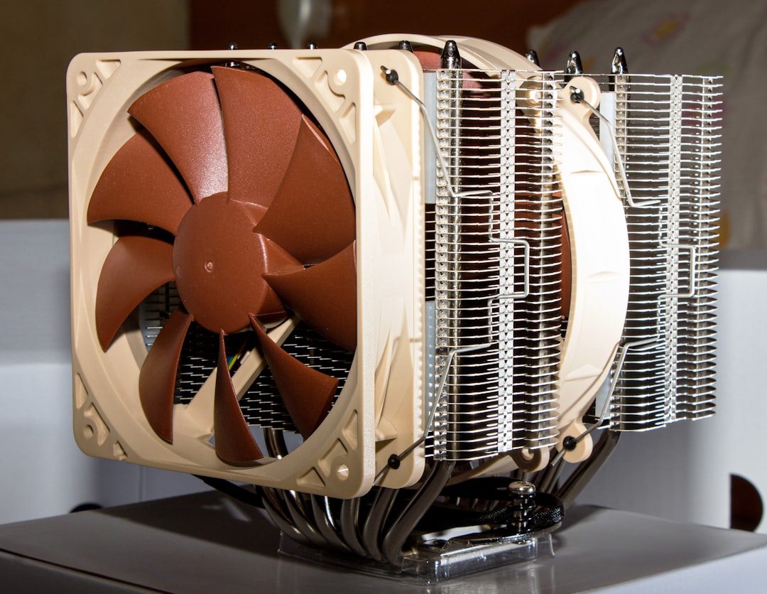 brown and white box fan dusty computer fan, thermal paste application, pc cleaning