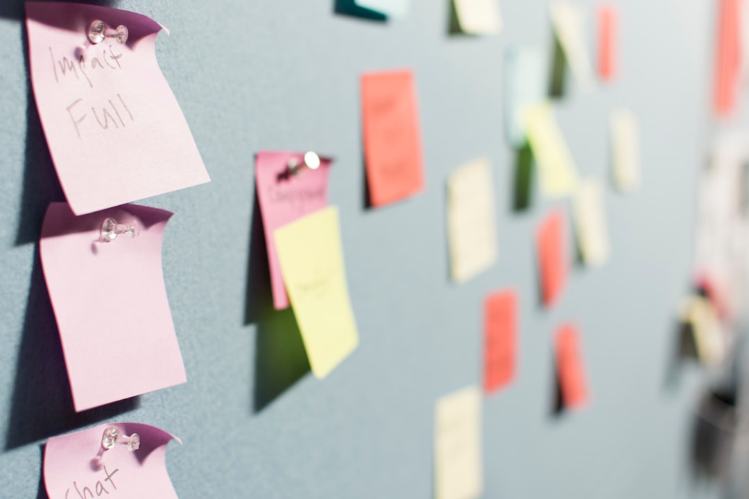 colorful sticky notes pinned to board call notes, consultant planning, next steps