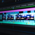 flat screen monitor video editing interface, subtitle timeline, transcription software screen