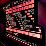 white destination signage movie library interface, film catalog app screen, digital collection dashboard