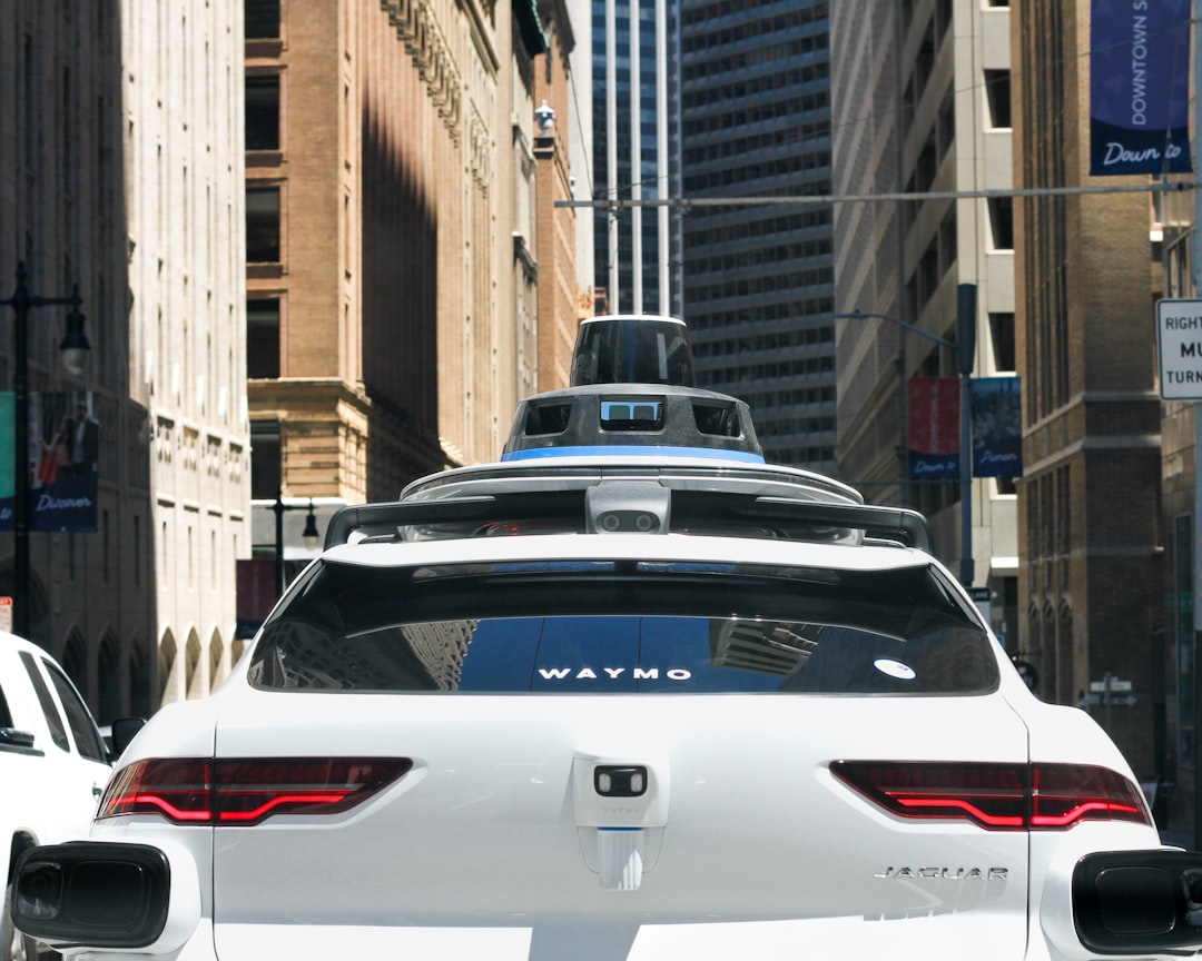 a car that is driving down the street autonomous vehicle, retail analytics, healthcare video, smart surveillance