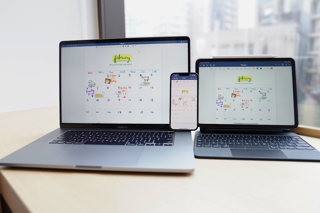 a couple of laptops on a table mobile desktop tablet screenshots, responsive design comparison, device rendering examples